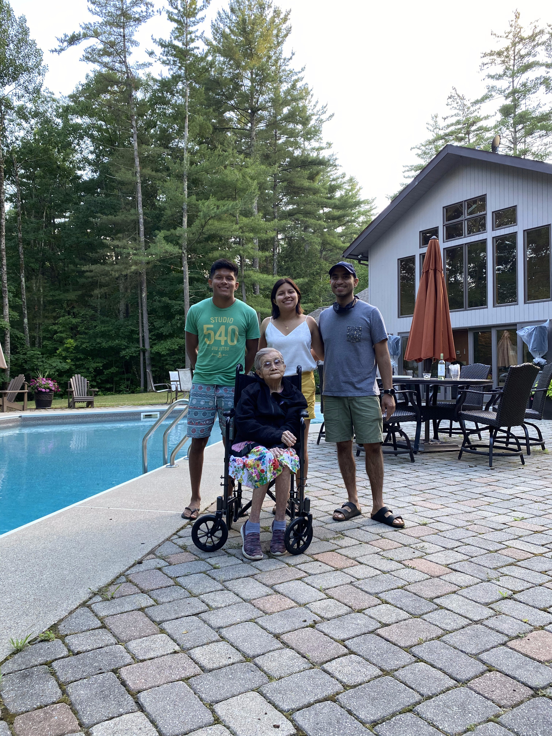 Family photo by the poolside